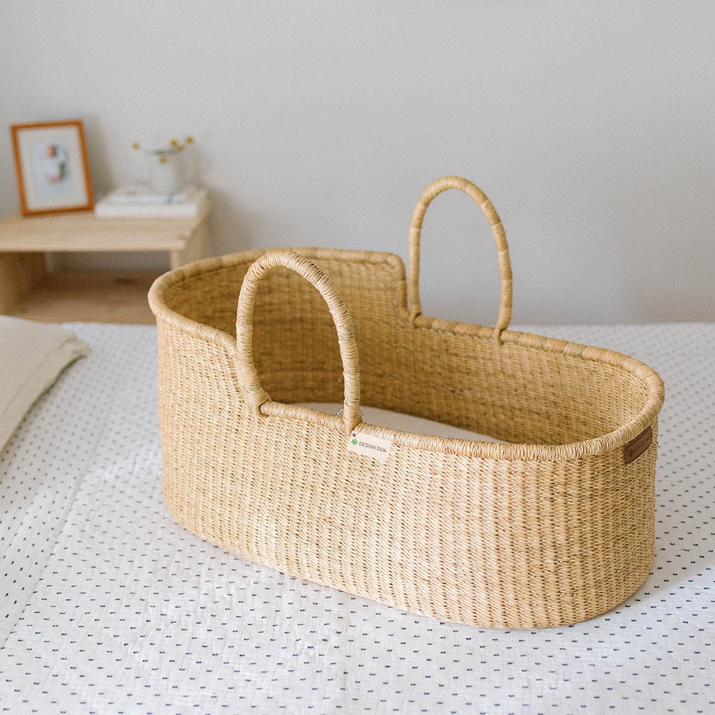 Design Dua. Bilia Bassinet Natural Basket w/Foam Pad (In Stock) / Vegan Grass (No Leather Added) / Pad Only Design Dua Signature Bilia Bassinet: Vegan (No Leather Handle/ Only Grass)