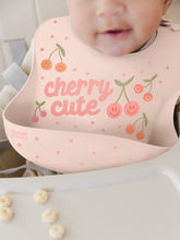 Load image into Gallery viewer, JuJuBe Silicone Bibs JuJuBe Silicone Bib - Cherry Cute by Doodle By Meg